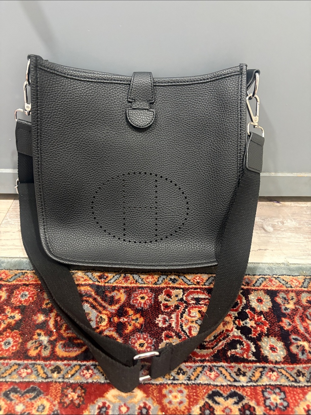 Hermès
Black Clemence Mini Evelyne  bag